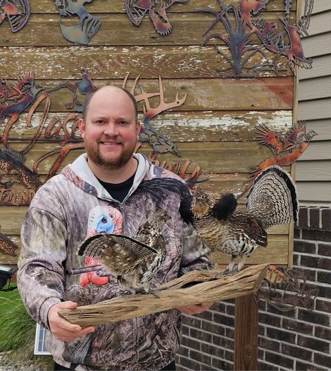 Customer with their finished mount from Jason's Taxidermy