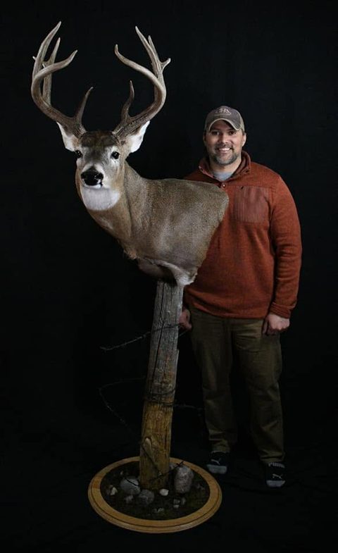 Customer with their finished mount from Jason's Taxidermy