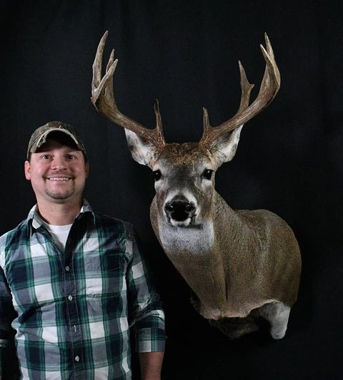 Customer with their finished mount from Jason's Taxidermy