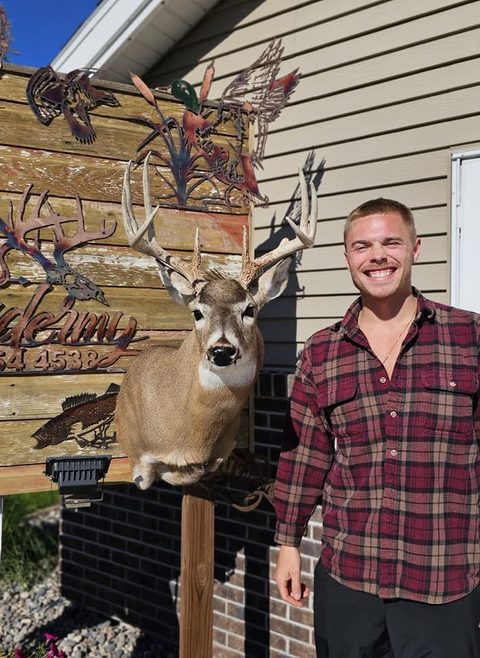 Customer with their finished mount from Jason's Taxidermy