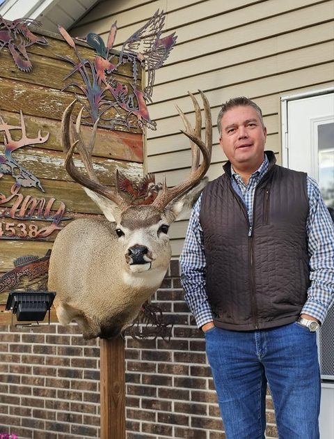 Customer with their finished mount from Jason's Taxidermy