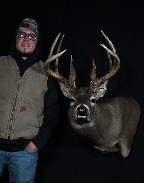 Customer with their finished mount from Jason's Taxidermy