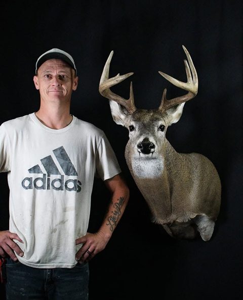Customer with their finished mount from Jason's Taxidermy