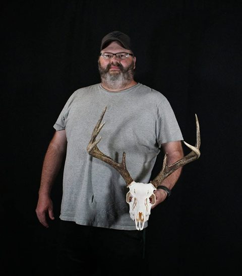 Customer with their finished mount from Jason's Taxidermy