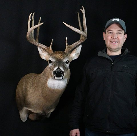 Customer with their finished mount from Jason's Taxidermy