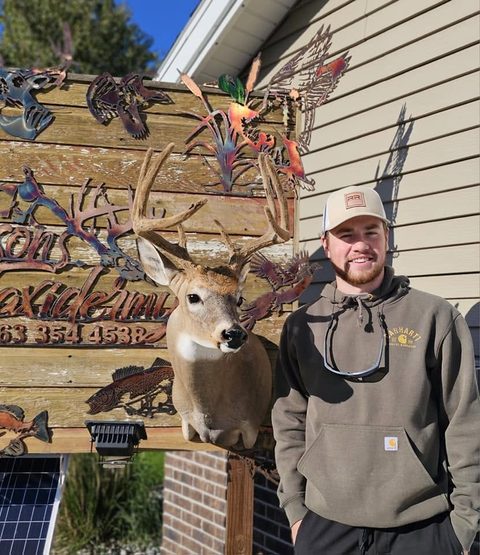 Customer with their finished mount from Jason's Taxidermy