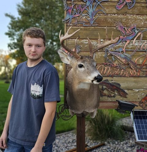 Customer with their finished mount from Jason's Taxidermy