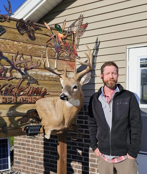 Customer with their finished mount from Jason's Taxidermy