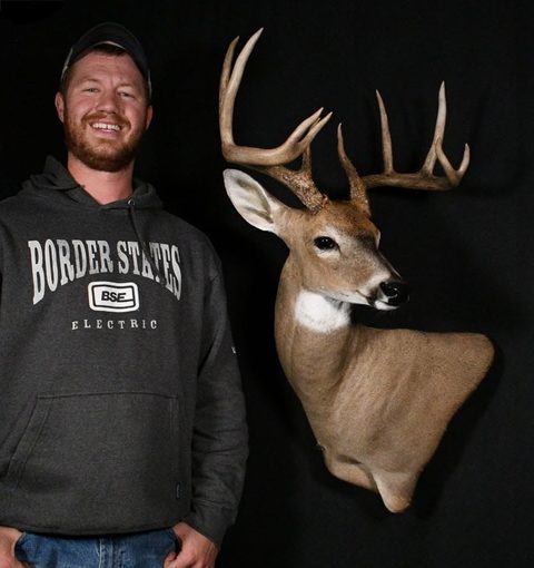 Customer with their finished mount from Jason's Taxidermy