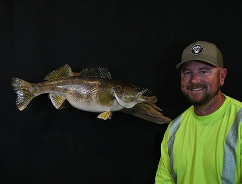 Customer with their finished mount from Jason's Taxidermy
