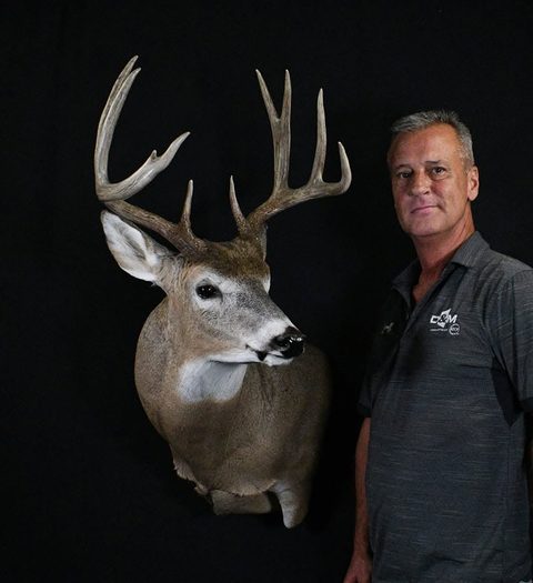 Customer with their finished mount from Jason's Taxidermy