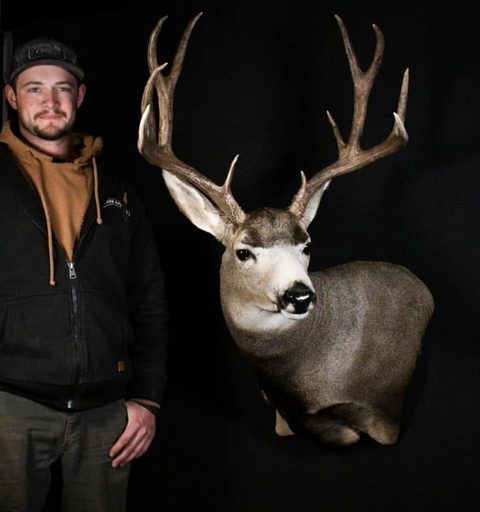 Customer with their finished mount from Jason's Taxidermy