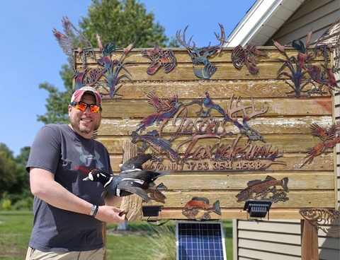 Customer with their finished mount from Jason's Taxidermy