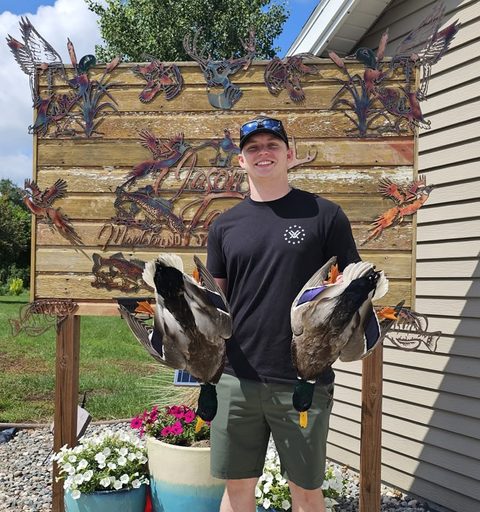 Customer with their finished mount from Jason's Taxidermy