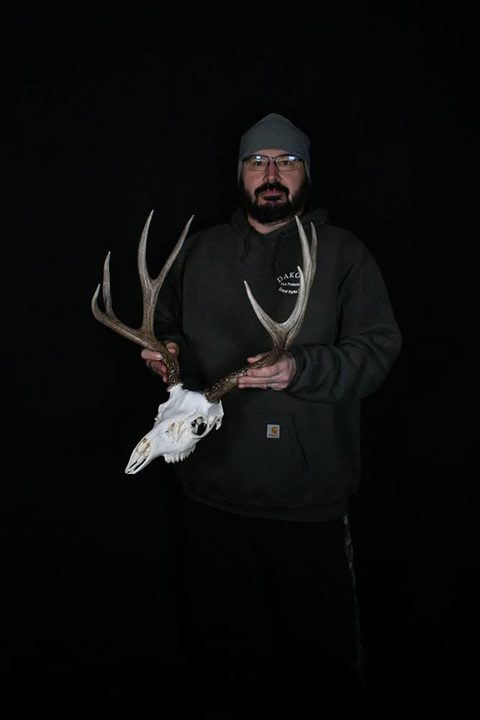 Customer with their finished mount from Jason's Taxidermy