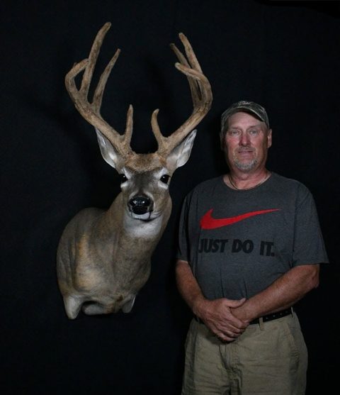 Customer with their finished mount from Jason's Taxidermy