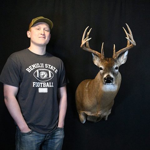 Customer with their finished mount from Jason's Taxidermy