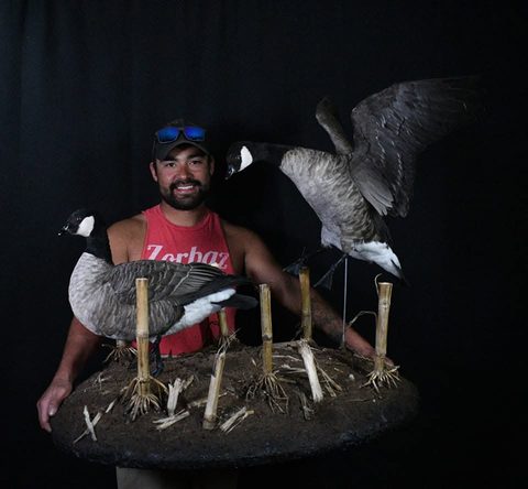 Customer with their finished mount from Jason's Taxidermy