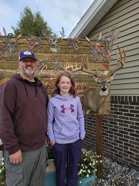 Customer with their finished mount from Jason's Taxidermy