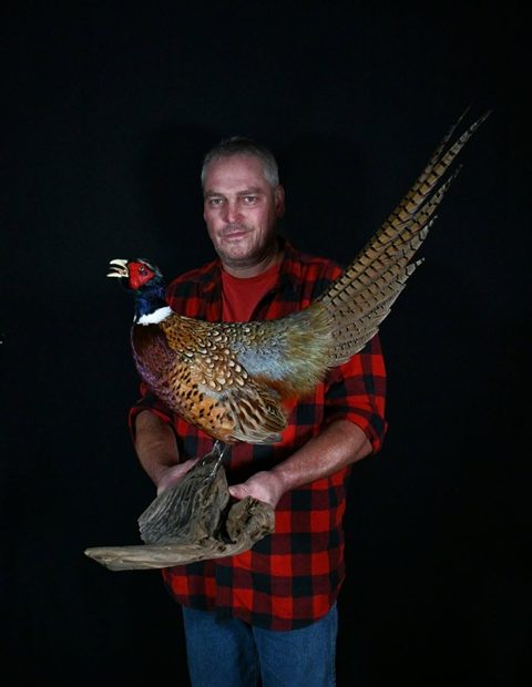 Customer with their finished mount from Jason's Taxidermy