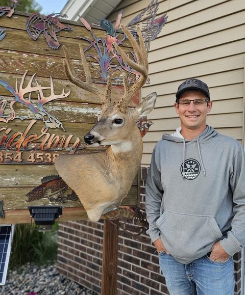 Customer with their finished mount from Jason's Taxidermy