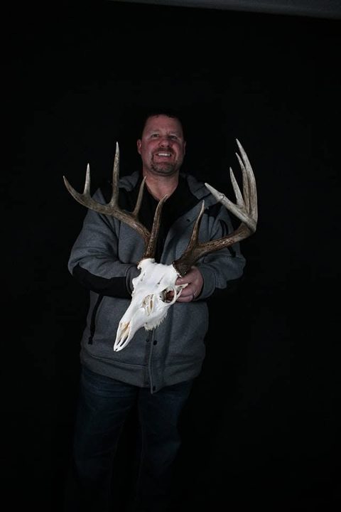 Customer with their finished mount from Jason's Taxidermy