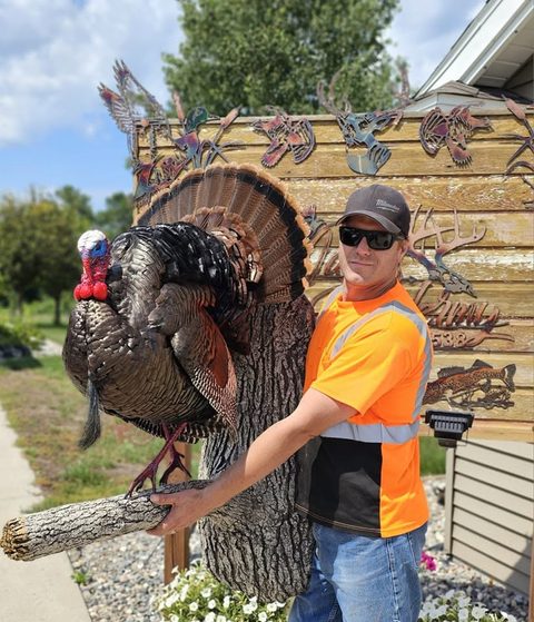 Customer with their finished mount from Jason's Taxidermy