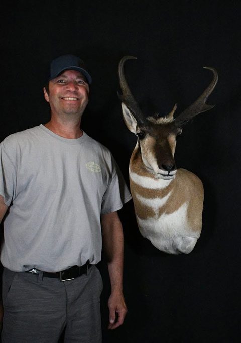 Customer with their finished mount from Jason's Taxidermy