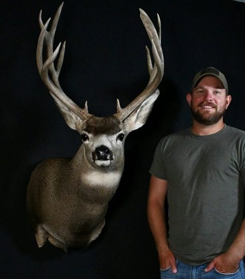 Customer with their finished mount from Jason's Taxidermy