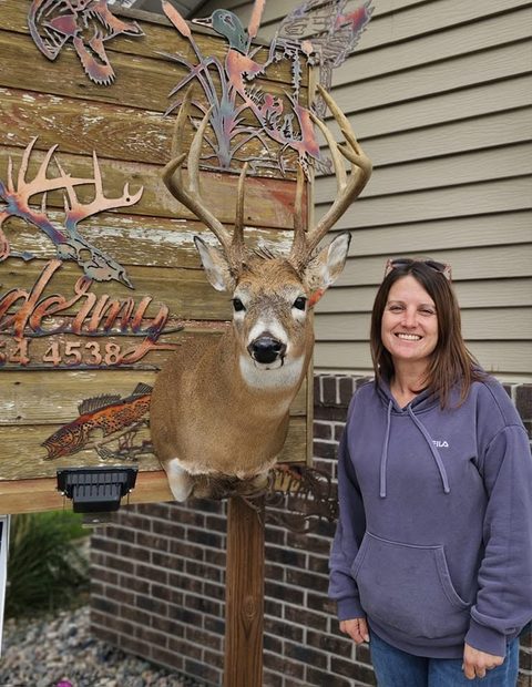 Customer with their finished mount from Jason's Taxidermy