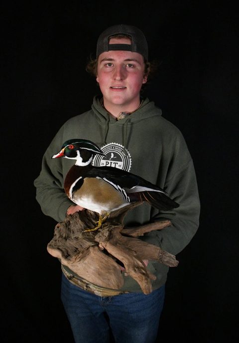 Customer with their finished mount from Jason's Taxidermy