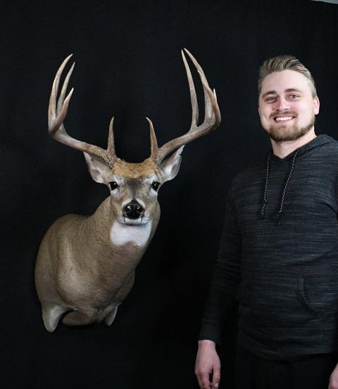 Customer with their finished mount from Jason's Taxidermy