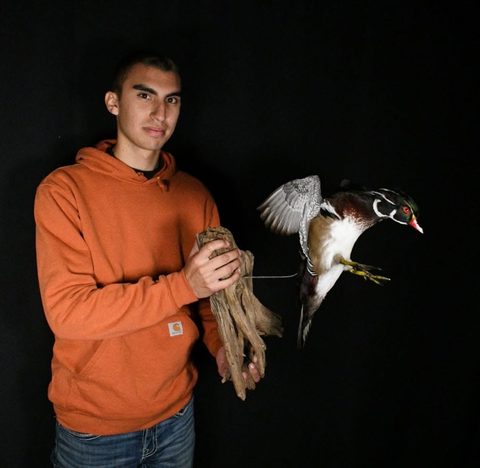 Customer with their finished mount from Jason's Taxidermy