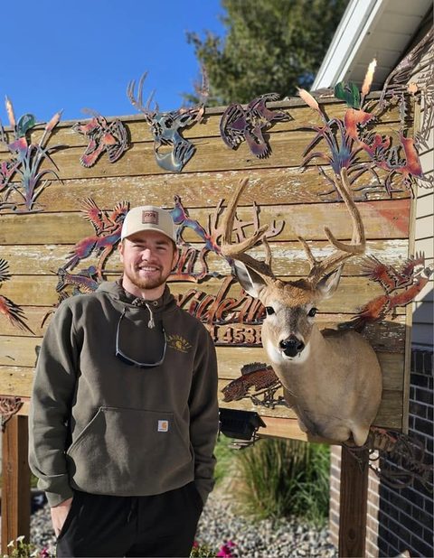 Customer with their finished mount from Jason's Taxidermy