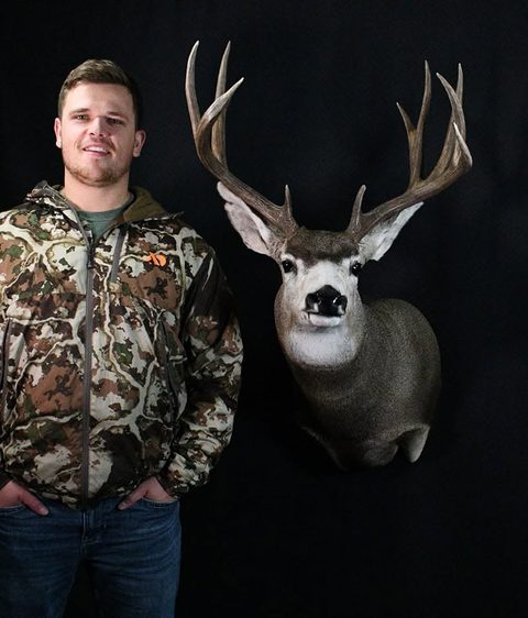 Customer with their finished mount from Jason's Taxidermy