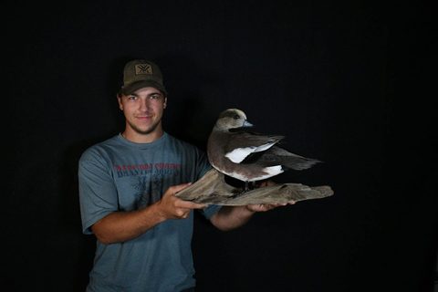 Customer with their finished mount from Jason's Taxidermy