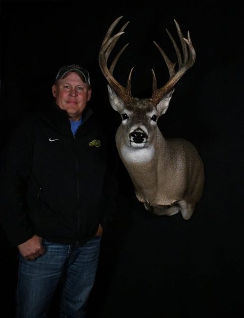 Customer with their finished mount from Jason's Taxidermy