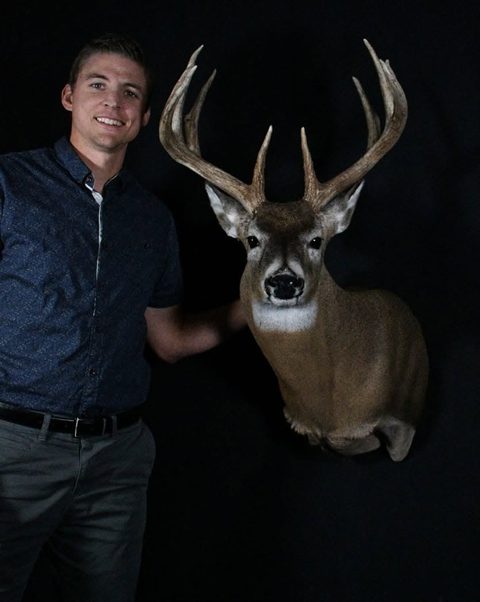 Customer with their finished mount from Jason's Taxidermy