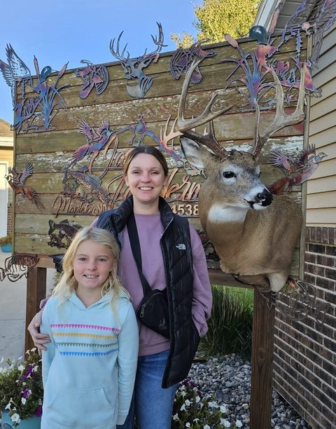 Customer with their finished mount from Jason's Taxidermy
