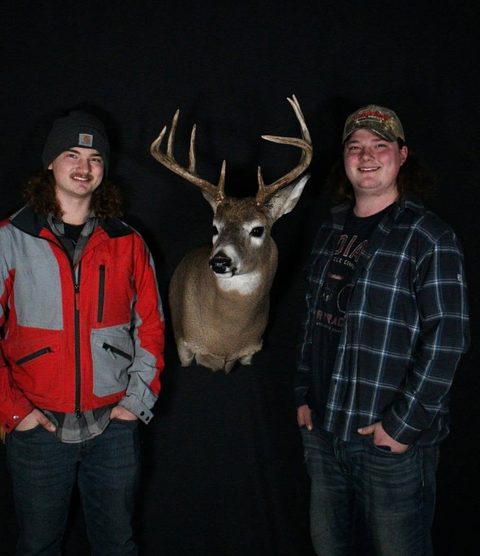Customer with their finished mount from Jason's Taxidermy
