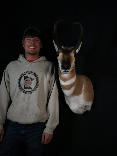 Customer with their finished mount from Jason's Taxidermy