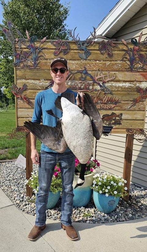 Customer with their finished mount from Jason's Taxidermy