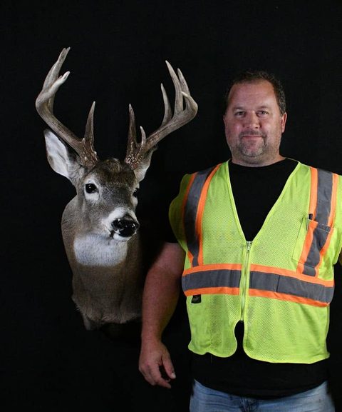 Customer with their finished mount from Jason's Taxidermy
