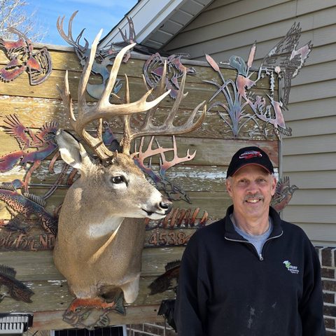 Customer with their finished mount from Jason's Taxidermy