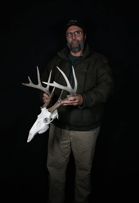 Customer with their finished mount from Jason's Taxidermy