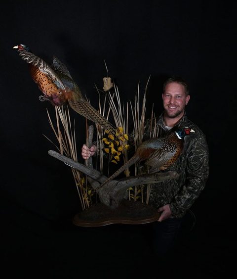 Customer with their finished mount from Jason's Taxidermy