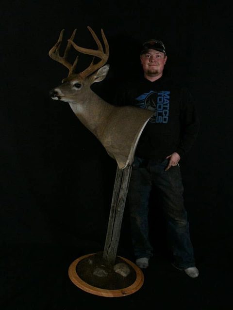 Customer with their finished mount from Jason's Taxidermy