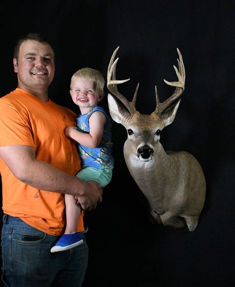 Customer with their finished mount from Jason's Taxidermy
