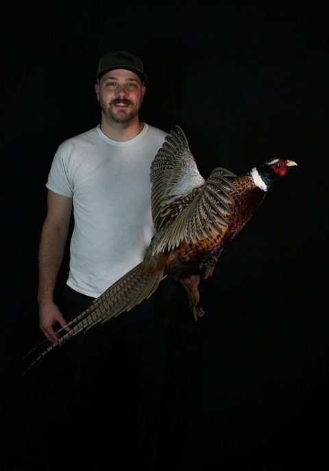 Customer with their finished mount from Jason's Taxidermy