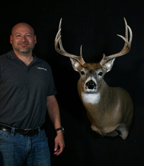 Customer with their finished mount from Jason's Taxidermy